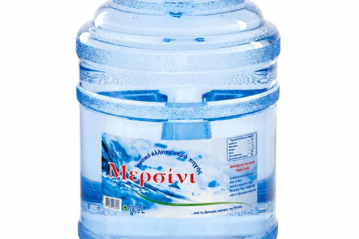 Large blue 18.9 L water bottle with a blue cap on a white background, label visible on the jug